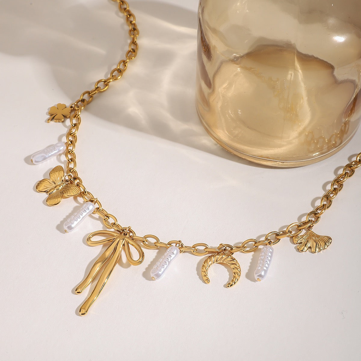 Bow pendant Butterfly Baroque Pearls multiple charms Necklace