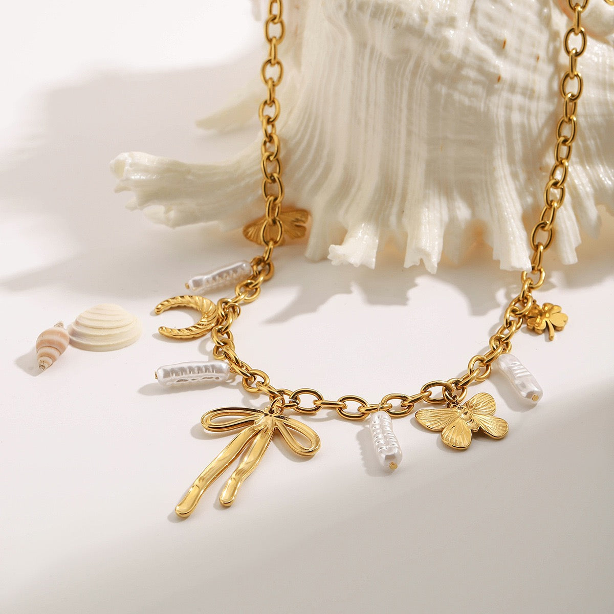 Bow pendant Butterfly Baroque Pearls multiple charms Necklace