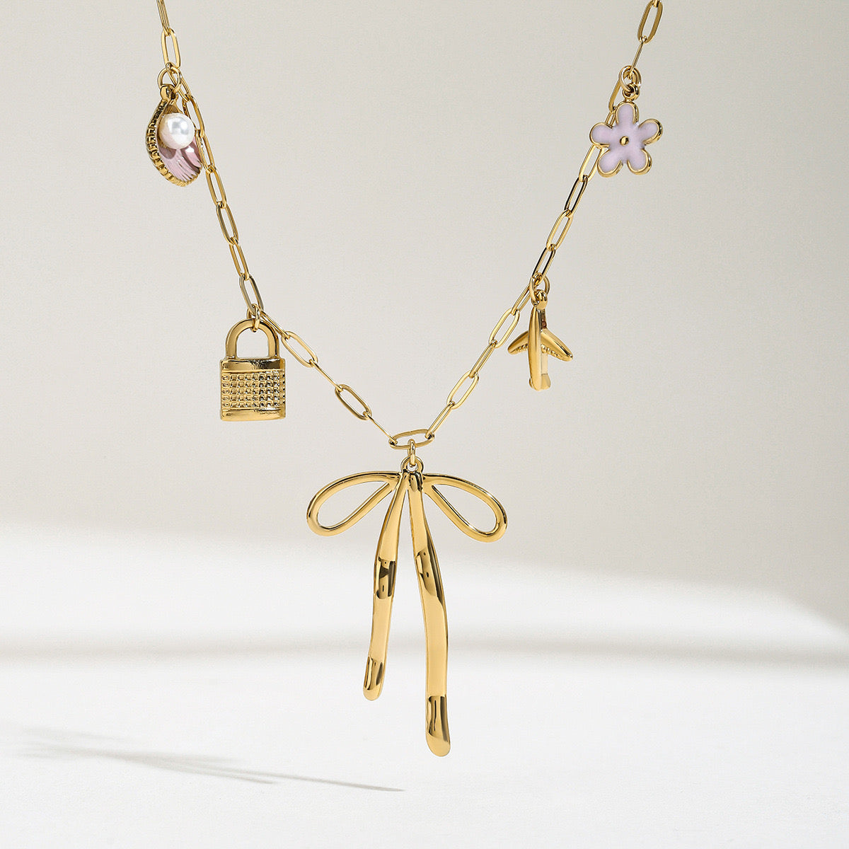 Bow and pick flower lock Multi Charm Necklace